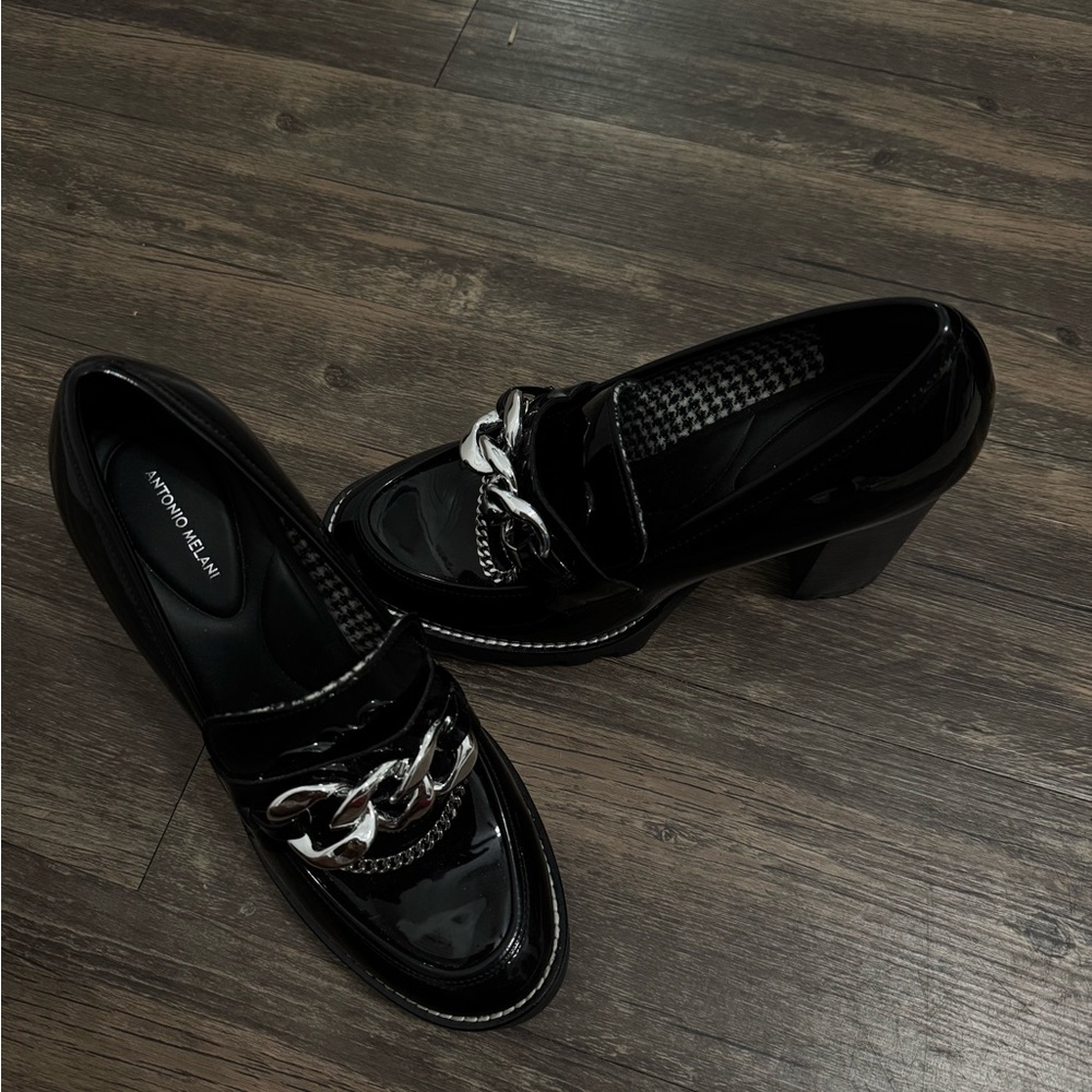 ANTONIO MELANI Glossy Black Loafers with Silver Accent
